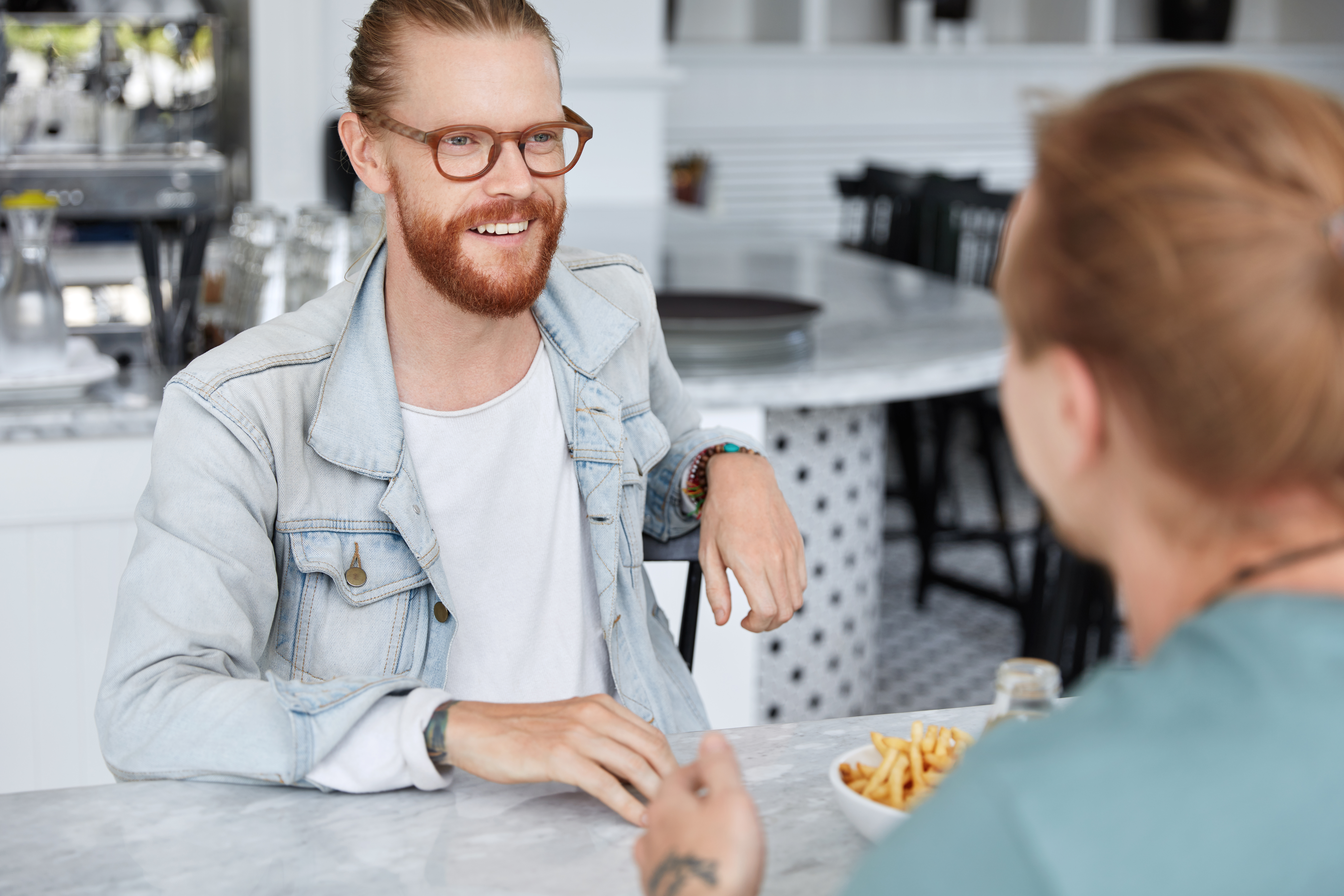 Two best friends meet together at cafe, share news with each other, being happy to see, have dinner at cozy cafeteria, have friendly conversation. People, lifestyle, friendship, relationship concept